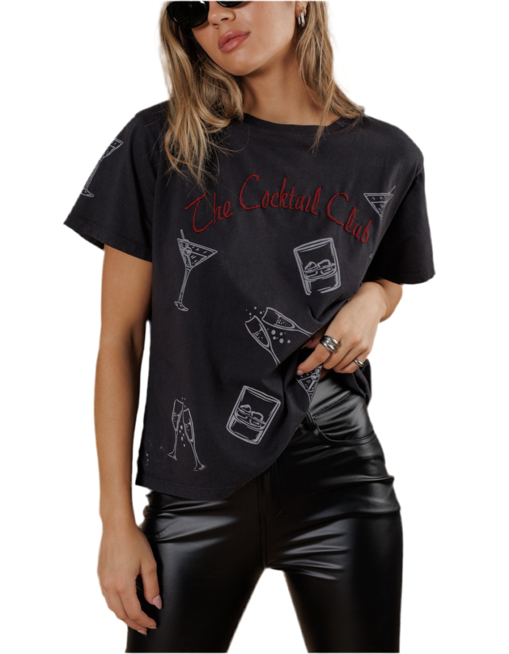 Person wearing a black t-shirt with cocktail-themed graphics and text.